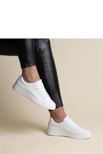 Stylish Solea white sneakers with rounded toes and black elements, crafted from eco-friendly materials for a trendy yet sustainable choice.