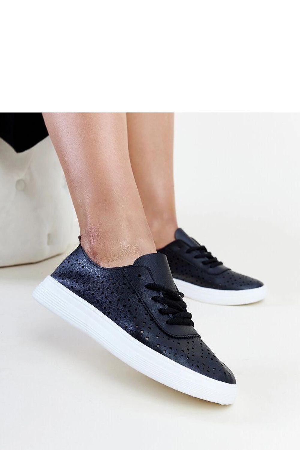 Side view of Solea Beige Openwork Manoek Adidas Sneakers on a white background, emphasizing the rubber sole and fashionable low-cut style ideal for spring and summer.