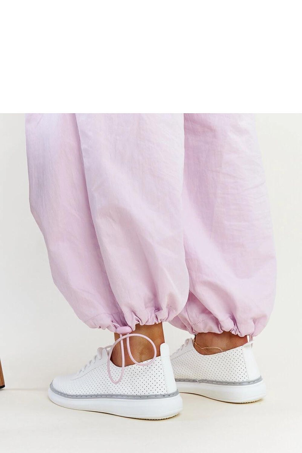 Close-up view of Solea Biserka eco leather sneakers, highlighting the chic white and grey colour scheme ideal for sporty elegance.