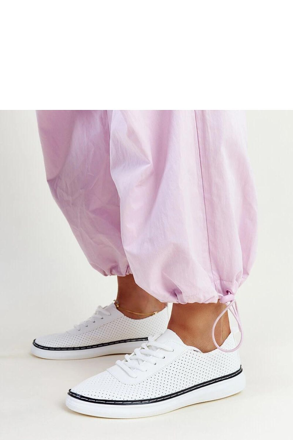 Solea eco leather sneakers in white and grey, featuring a stylish lace-up design for an active lifestyle.