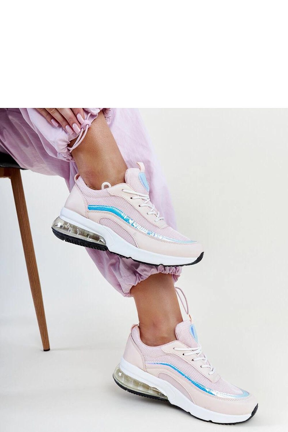 Elegant Solea pink hologram Jelka sneakers with a rounded toe and durable rubber sole, embodying luxury and comfort.