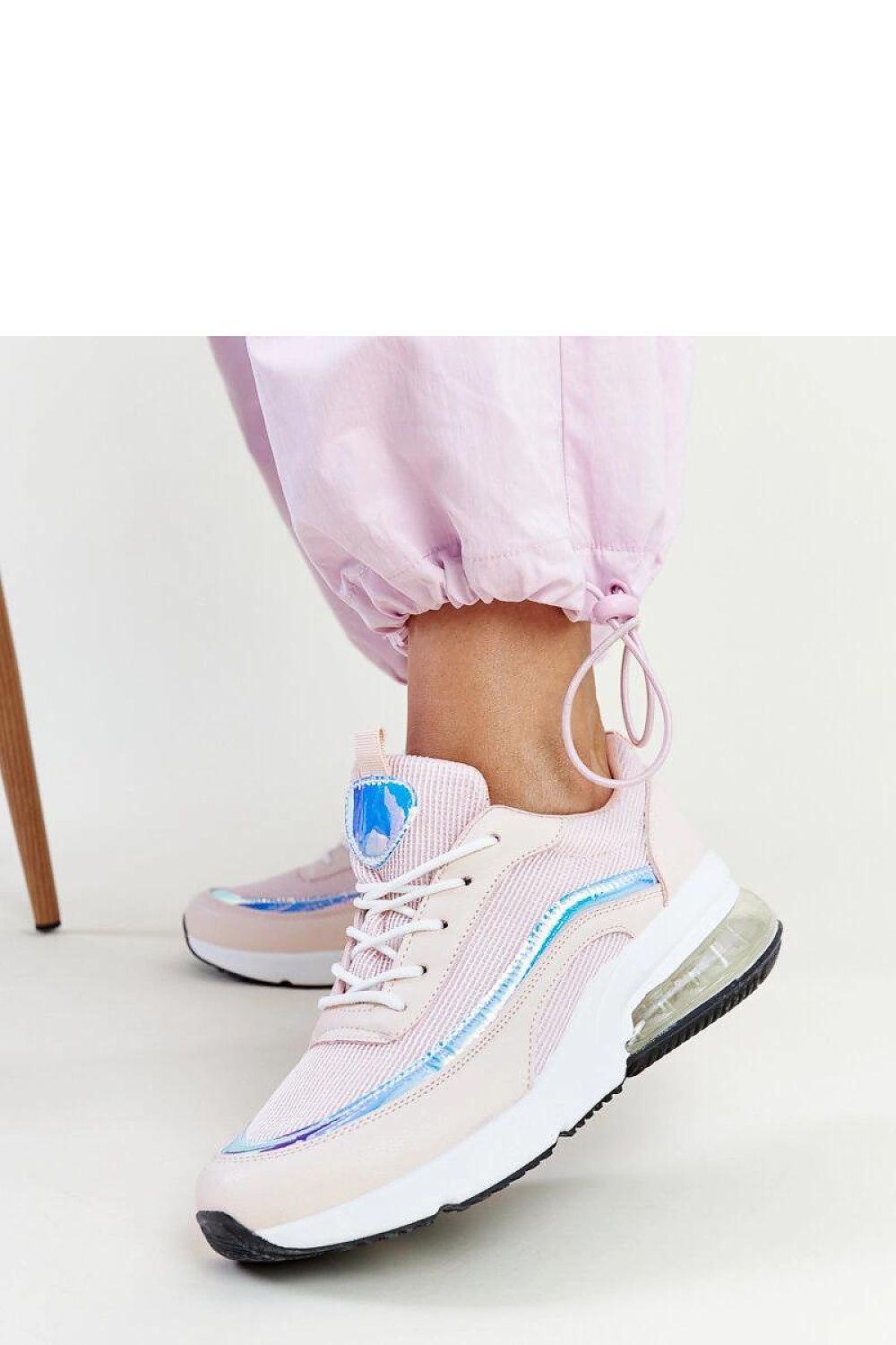 Close-up view of Solea pink hologram Jelka sneakers highlighting the innovative hologram effect and high-quality craftsmanship.