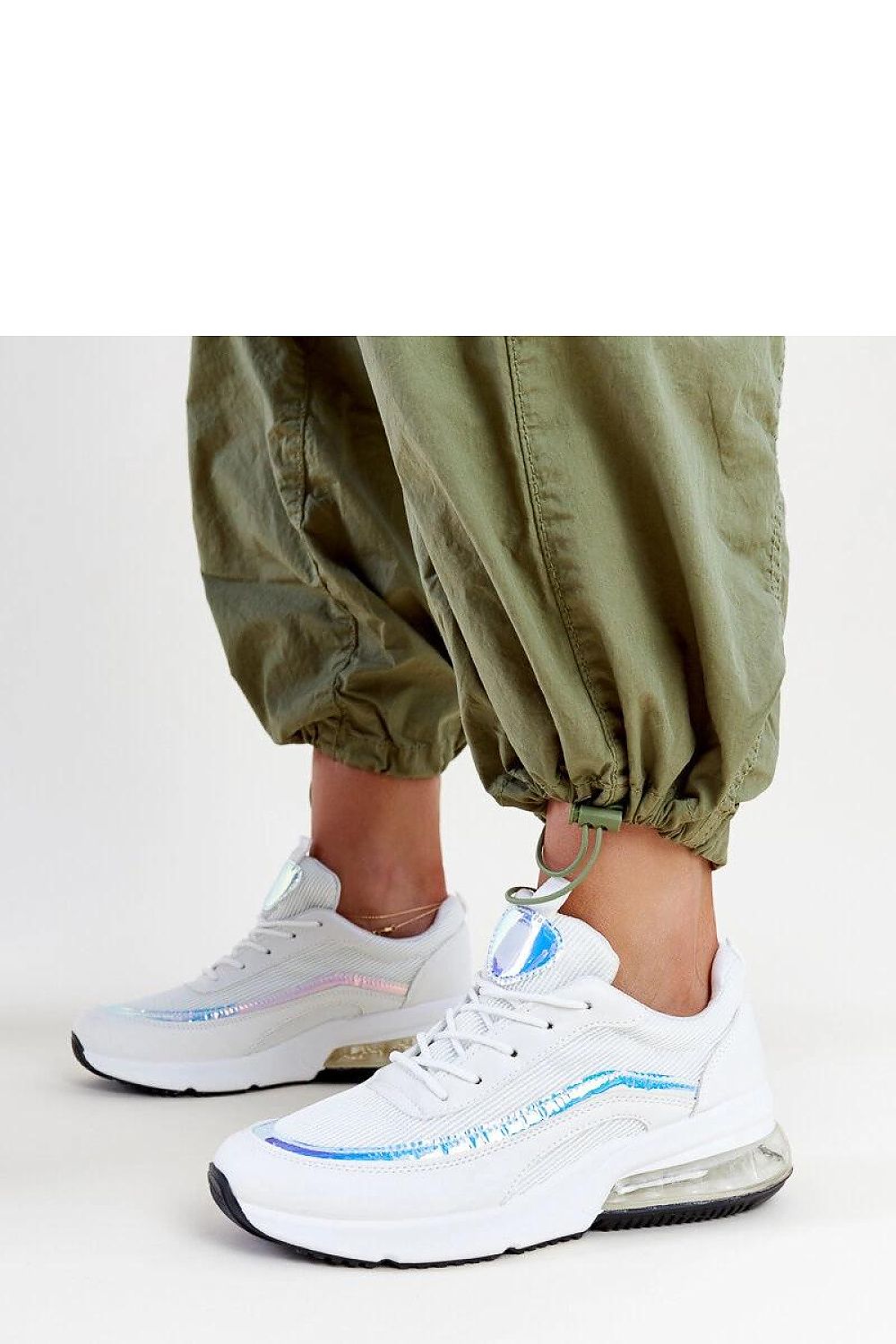 Side view of Solea Pink Hologram Jelka Sneakers showcasing the medium heel and rounded toe, designed for both elegance and comfort.