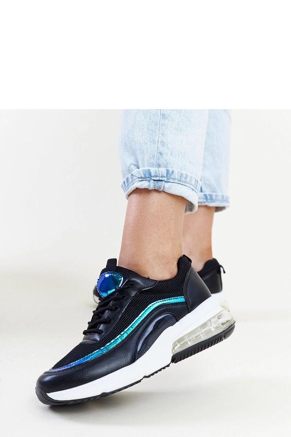 Solea pink hologram Jelka sneakers in a chic setting, demonstrating their unique design and contemporary appeal.