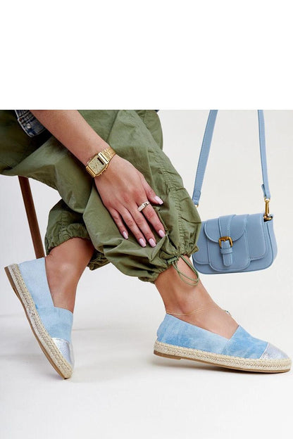 Chic Solea Surana espadrilles in blue-silver, showcasing a stylish and comfortable design ideal for summer outings.