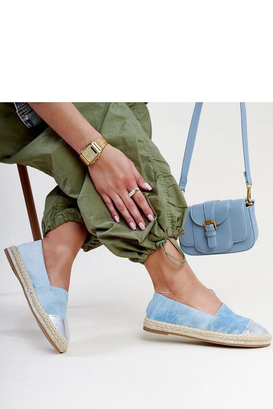 Chic Solea Surana espadrilles in blue-silver, showcasing a stylish and comfortable design ideal for summer outings.