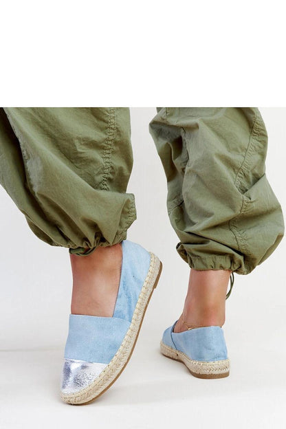 Sophisticated Solea Surana espadrilles with a low heel and vibrant blue-silver fabric, designed for ultimate comfort.