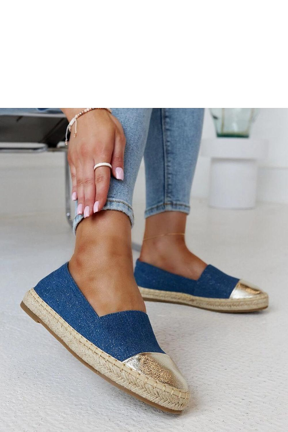 Fashion-forward Solea espadrilles in blue-silver for summer, combining style and comfort for discerning footwear lovers.