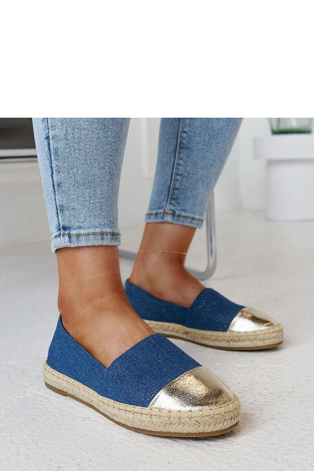 Solea Surana luxurious blue-silver espadrilles showcasing slip-on design perfect for summer fashion.
