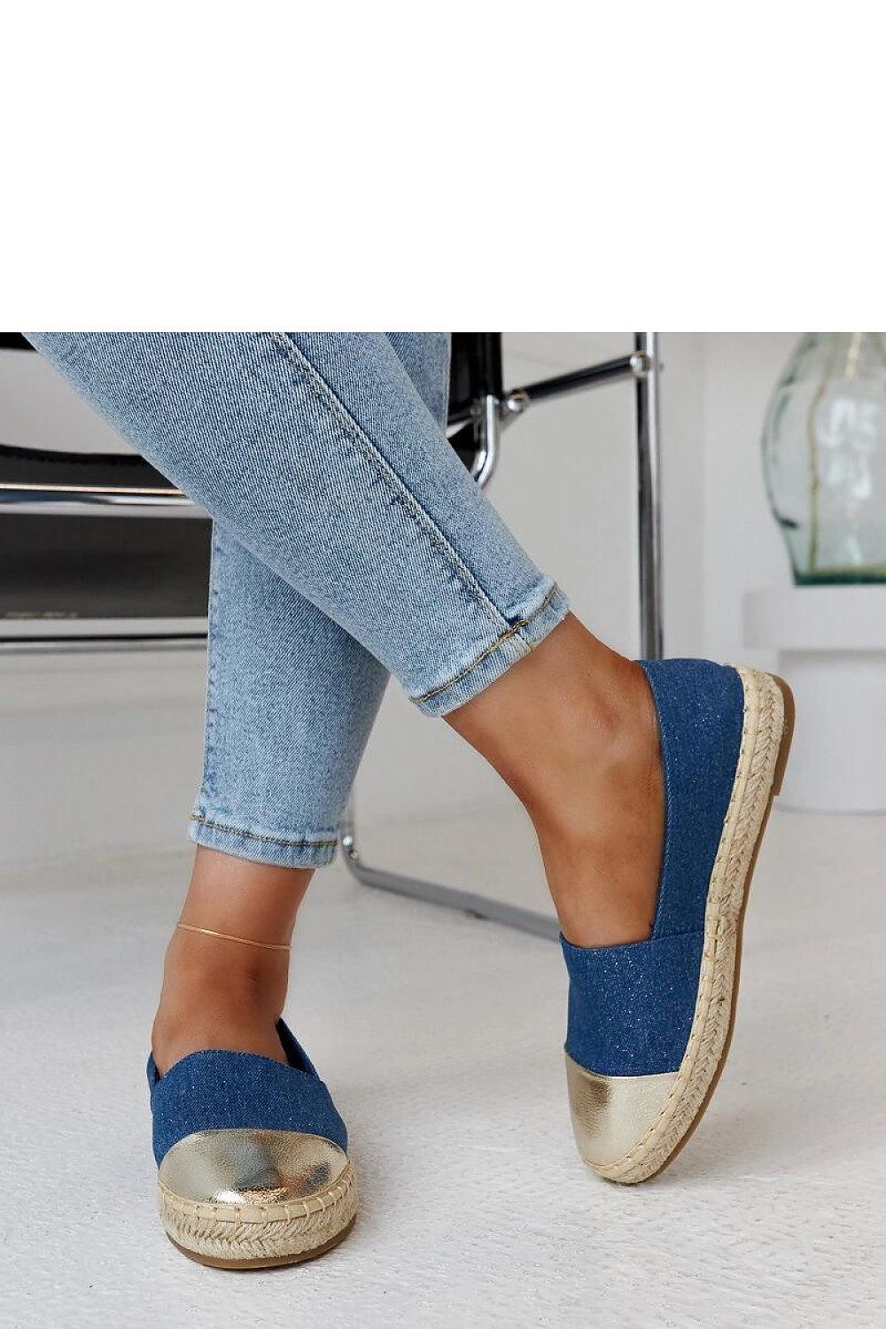 Stylish Solea Surana espadrilles with a shimmering blue-silver finish ideal for hot summer days.