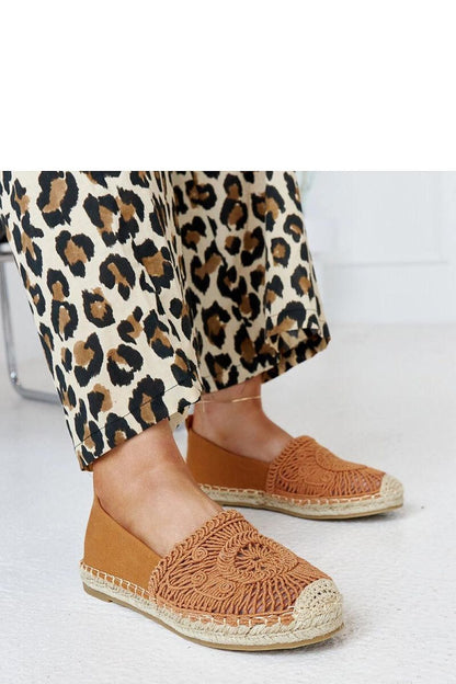Elegant brown embroidered Solea espadrilles featuring a rubber sole and a chic wrap-around fastening, ideal for summer fashion.