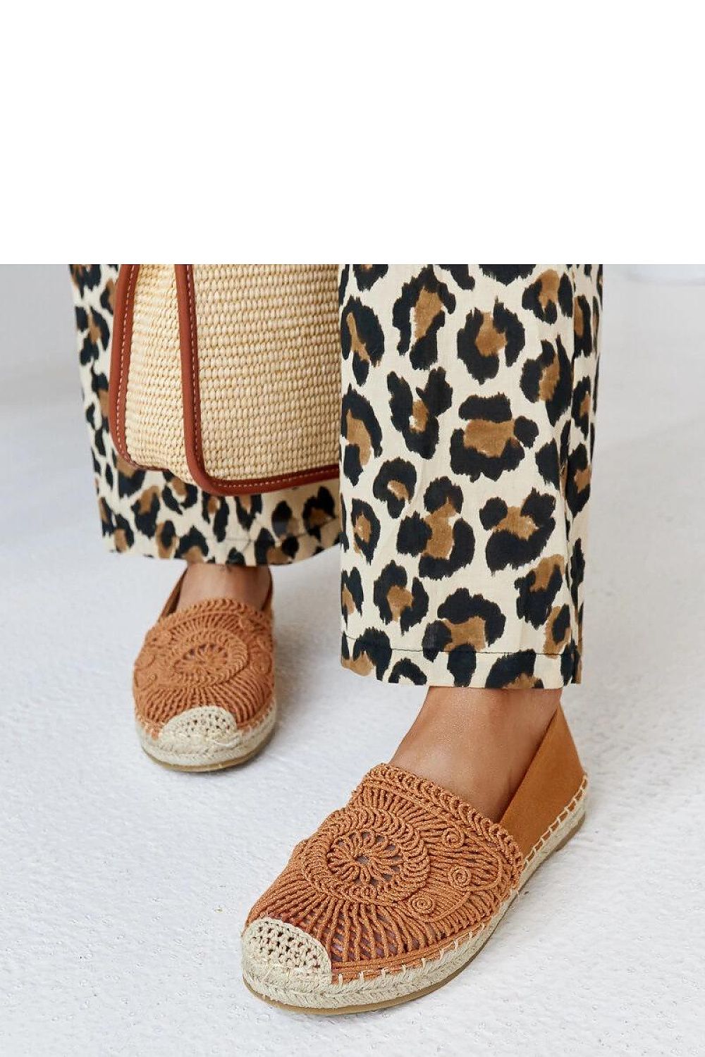 High-quality brown espadrilles by Solea, beautifully embroidered and designed for enduring comfort and style in warm weather.
