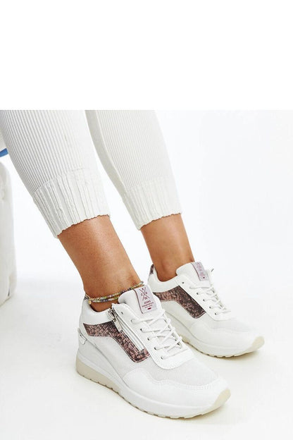 Elegant white women's sneakers with a wedge heel by Solea, showcasing a sporty design and comfortable round toe, perfect for sophisticated everyday wear.