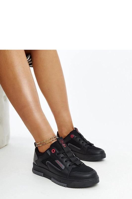 Solea Ladies' stylish black and grey sneakers, EU 36-41, showcasing their contemporary design and comfort for luxurious sports footwear.