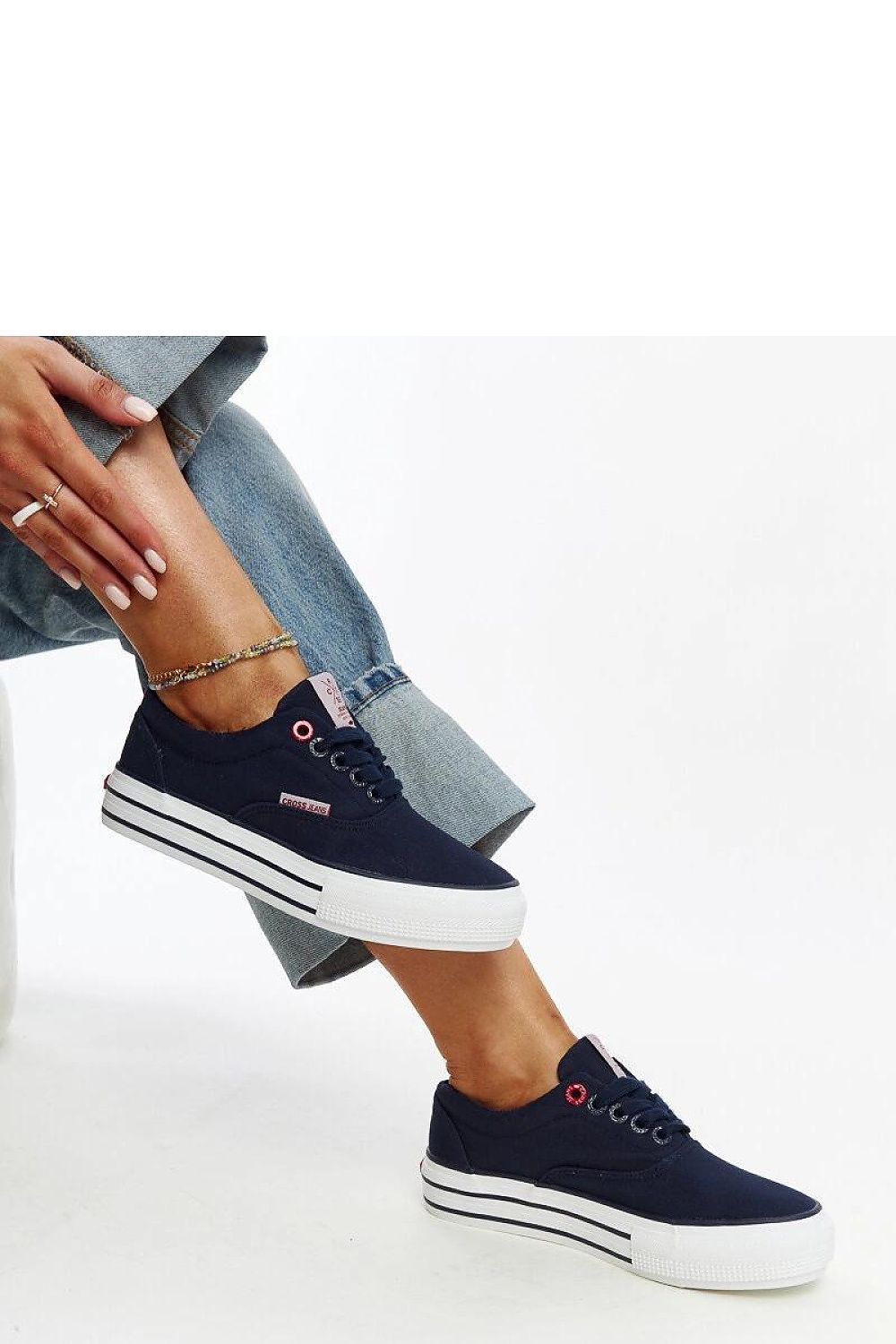 Stylish laced navy women's sneakers from Solea, offering a chic look and comfortable fit in sizes EU 36-41.