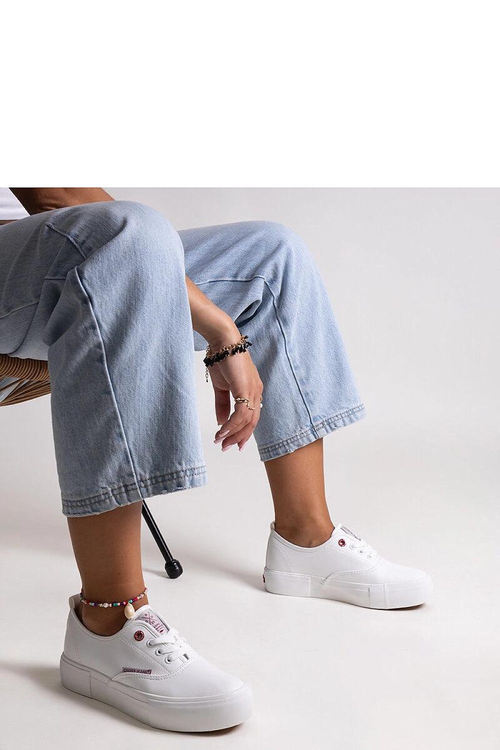 Solea luxury white sneakers for women, crafted with a robust rubber sole and fashionable laces, ideal for spring/summer stylish looks.