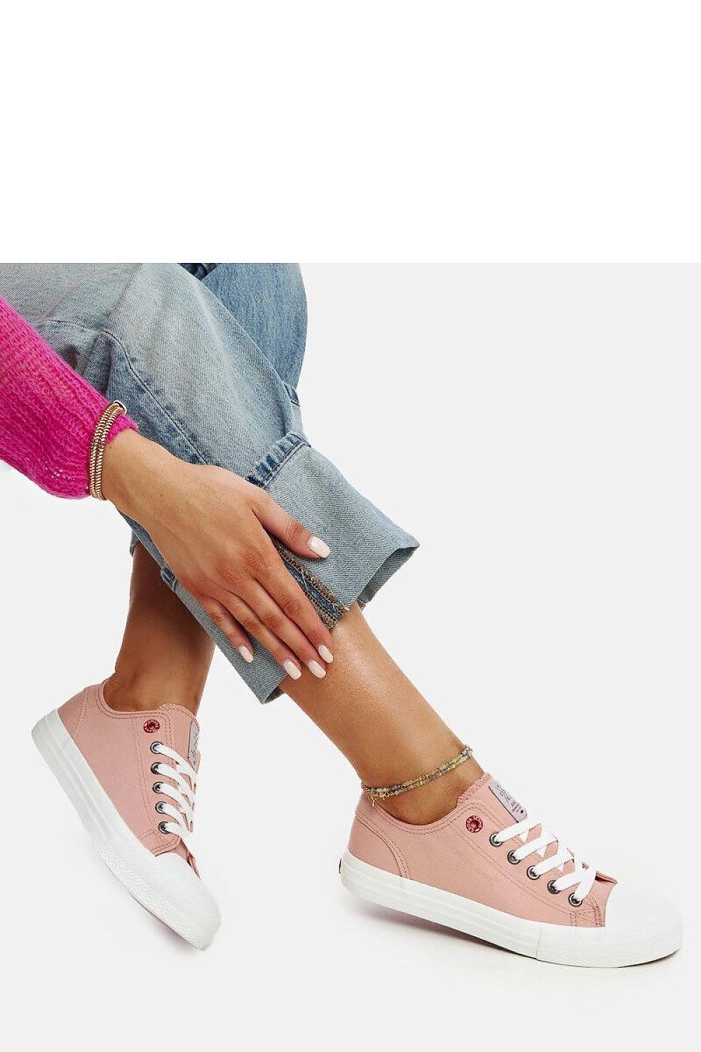 Stylish and elegant pink women's low-top sneakers by Solea, featuring a chic round toe design, red rubber sole, and laces, perfect for fashionable everyday wear.