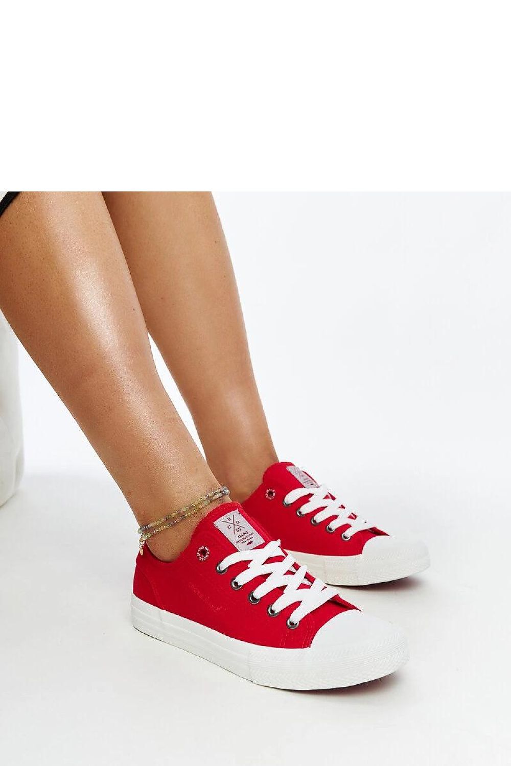 Elegant red women's lace-up sneakers by Solea featuring a flexible rubber sole, perfect for stylish everyday wear.