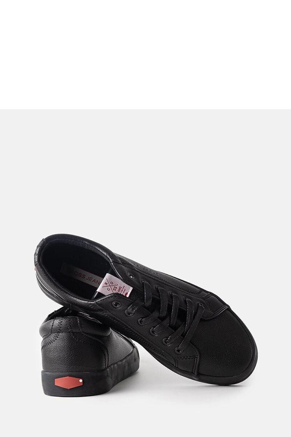 Side view of Solea's cross jeans black women's trainers, displaying a sleek silhouette with rounded toe and durable rubber sole for excellent grip.