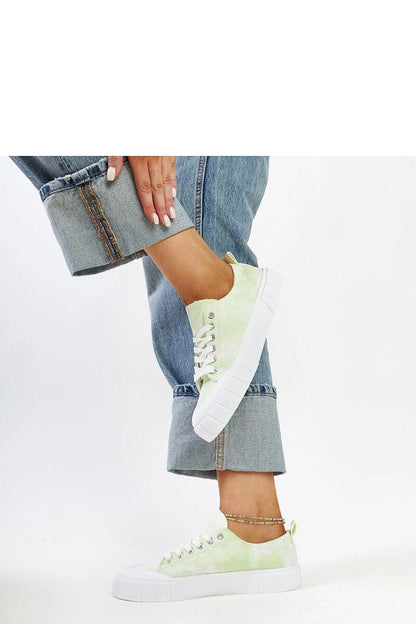 The light green Jerina Adidas sneakers by Solea, perfect for spring/summer fashion, combining style and comfort for the modern wearer.