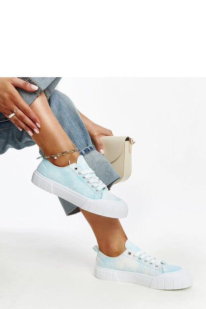 Elegant light green Jerina Adidas sneakers with a rounded toe, embodying comfort and fashion from Solea.