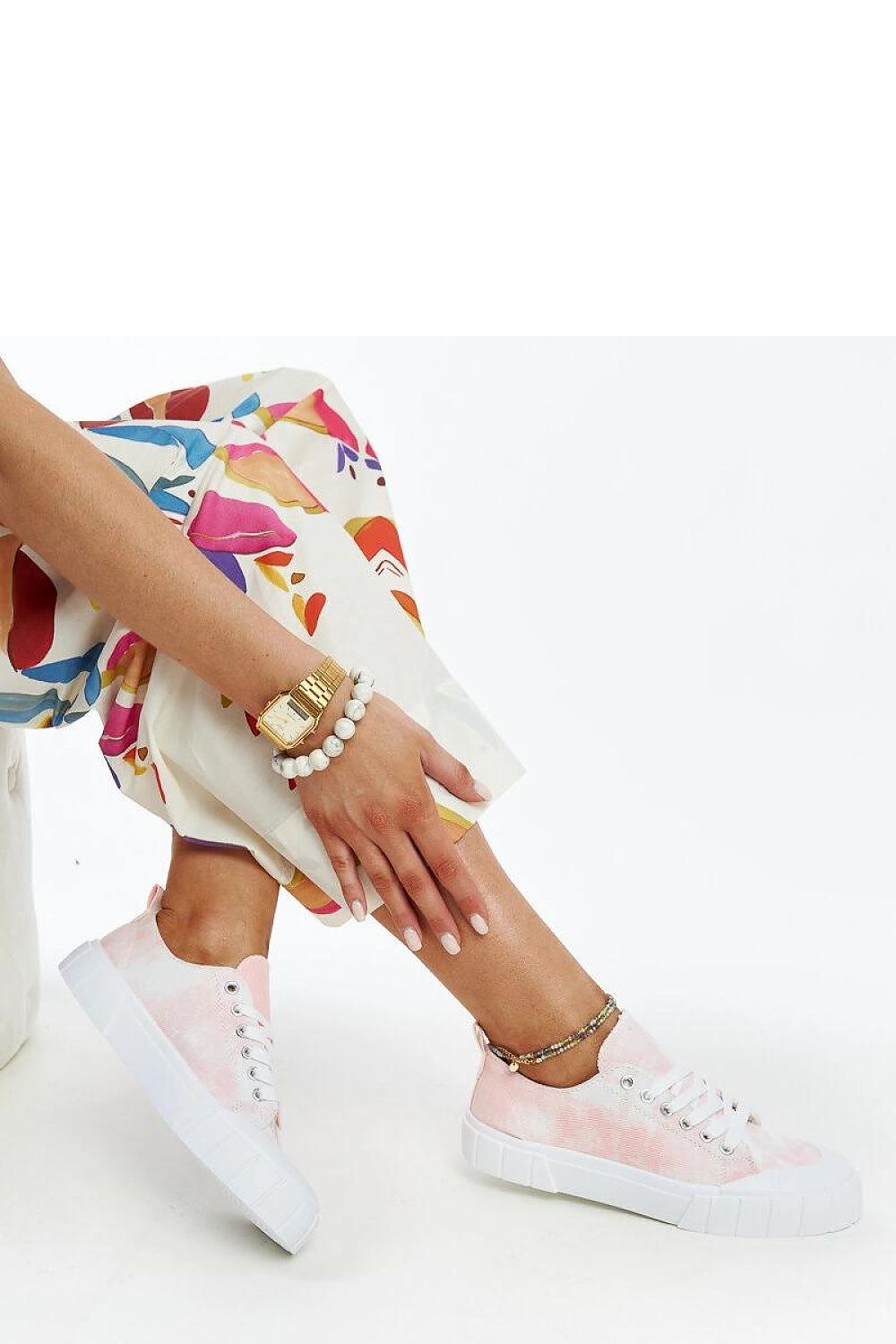 Solea light green Jerina Adidas sneakers showcased against a minimalist background, highlighting their trendy and fresh summer aesthetic.