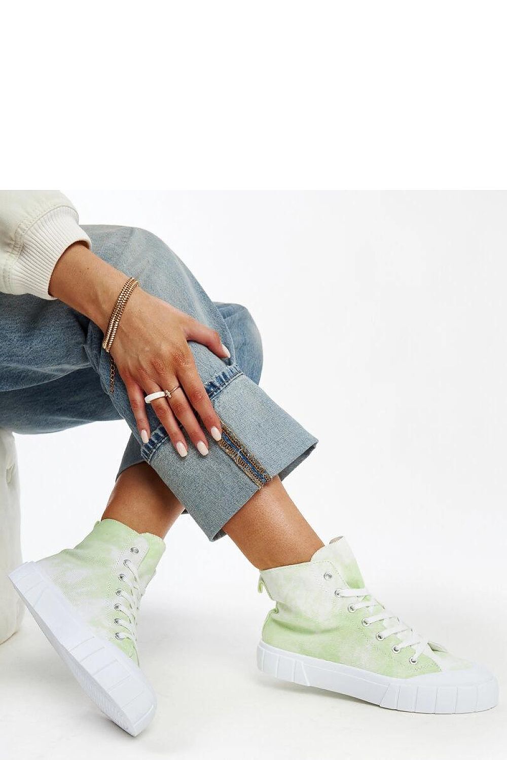 Solea light green high-top sneakers Raissa showcasing modern design and superior comfort featuring a rounded toe and rubber sole.