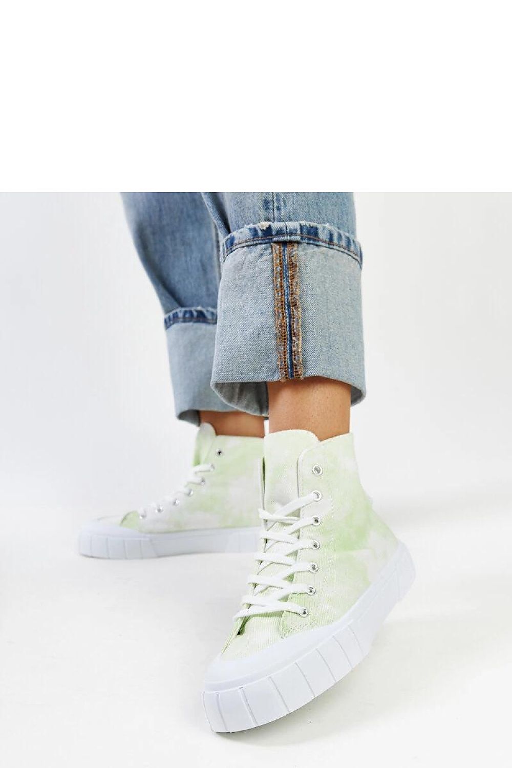 Close-up of Solea Raissa light green high-top sneaker's laced closure and high-quality fabric material, perfect for fashion-forward individuals.