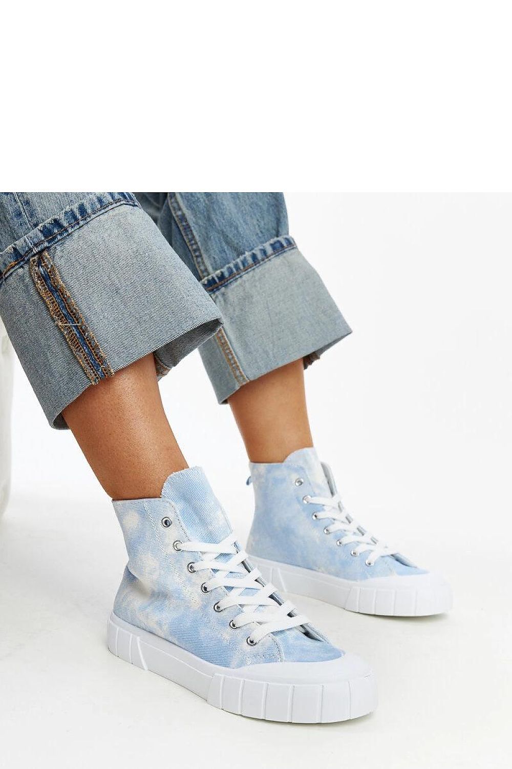 Elegant presentation of Solea light green high-top sneakers Raissa on a white backdrop, emphasizing their luxurious design and craftsmanship.