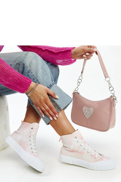 Luxurious Solea Raissa high-top sneakers in light green, perfect for spring/summer wear, emphasising a modern and fashionable aesthetic.