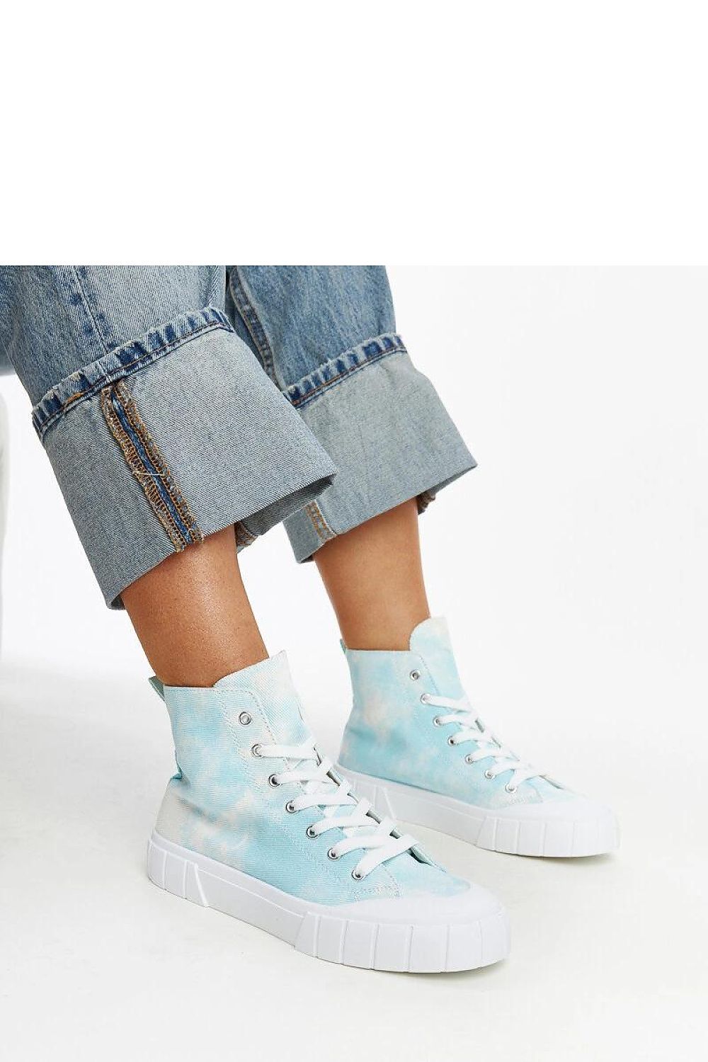 Stylish display of Solea Raissa light green high-top sneakers emphasizing the unique design and luxe fabric, a must-have addition to your footwear collection.