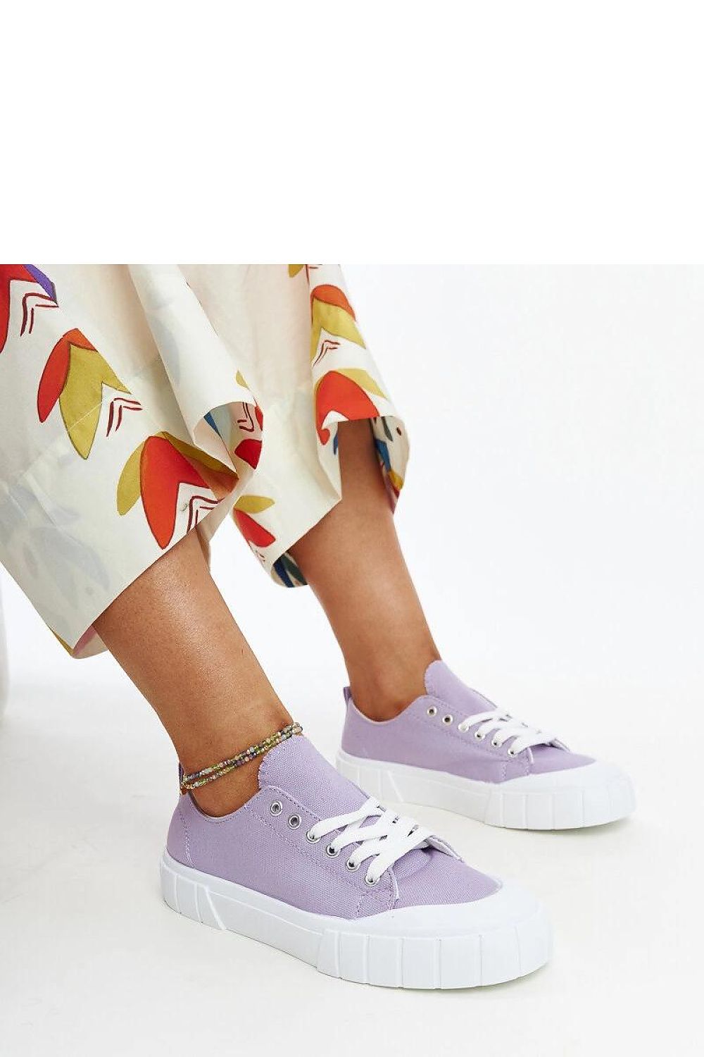 Solea light pink fabric sneakers for women, showcasing elegance and comfort with rounded toe design, perfect for summer outfits.