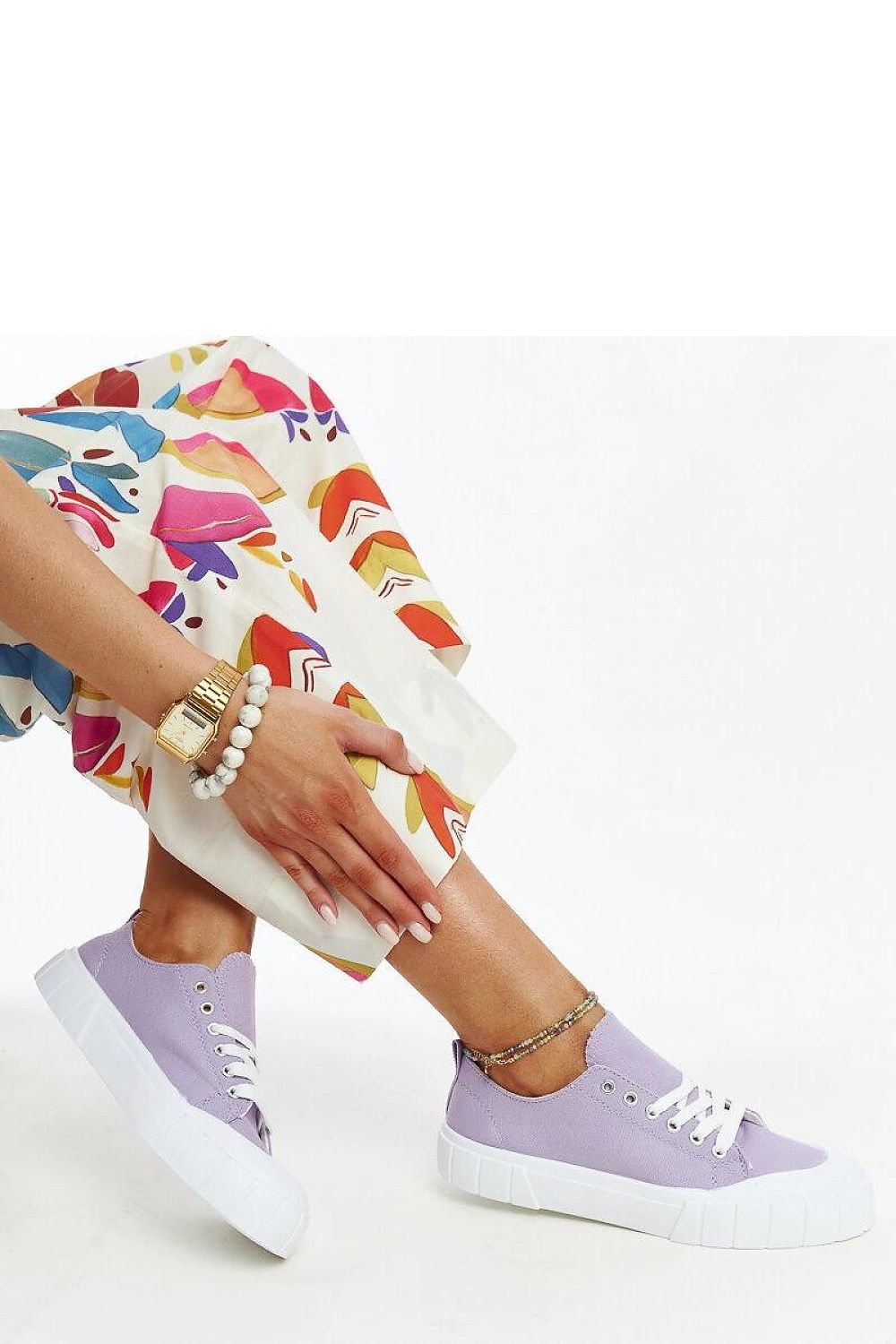 Side view of Solea elegant light pink fabric sneakers for women, highlighting their sleek design and summer-ready aesthetic.