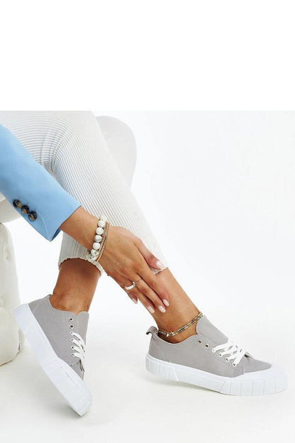 Solea elegant light pink fabric sneakers for women, showcasing a stylish laced design with a rounded toe, ideal for spring and summer fashion.