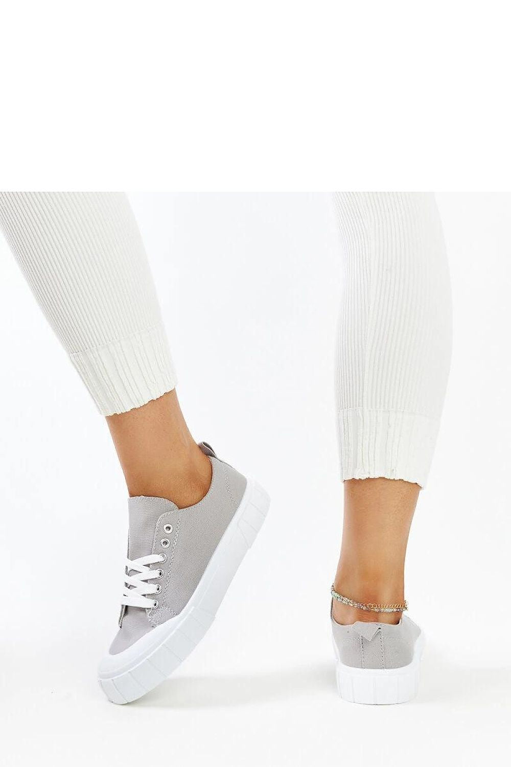 Top view of Solea light pink fabric sneakers for women, highlighting the trendy laced closure and elegant design for a fresh summer look.