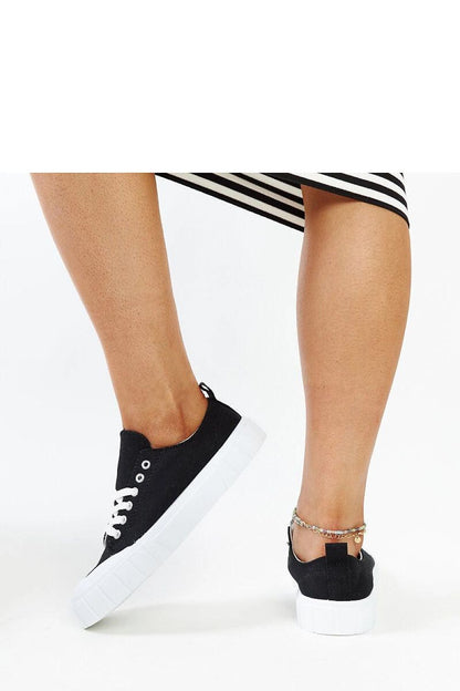 Solea women's light pink sneakers displayed on a lush background, emphasising their elegant and trendy appeal, ideal for the fashion-forward.