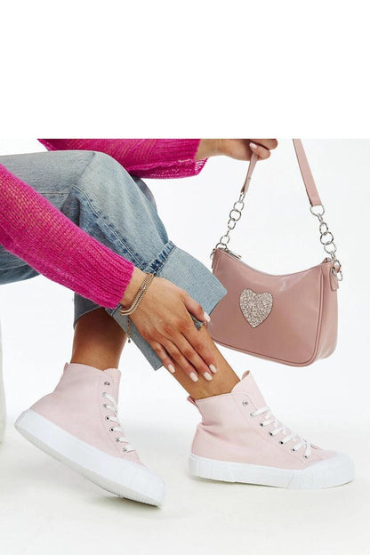 Close-up of Solea high-top pink sneakers, highlighting the elegant fabric upper and contemporary design for a chic summer look.