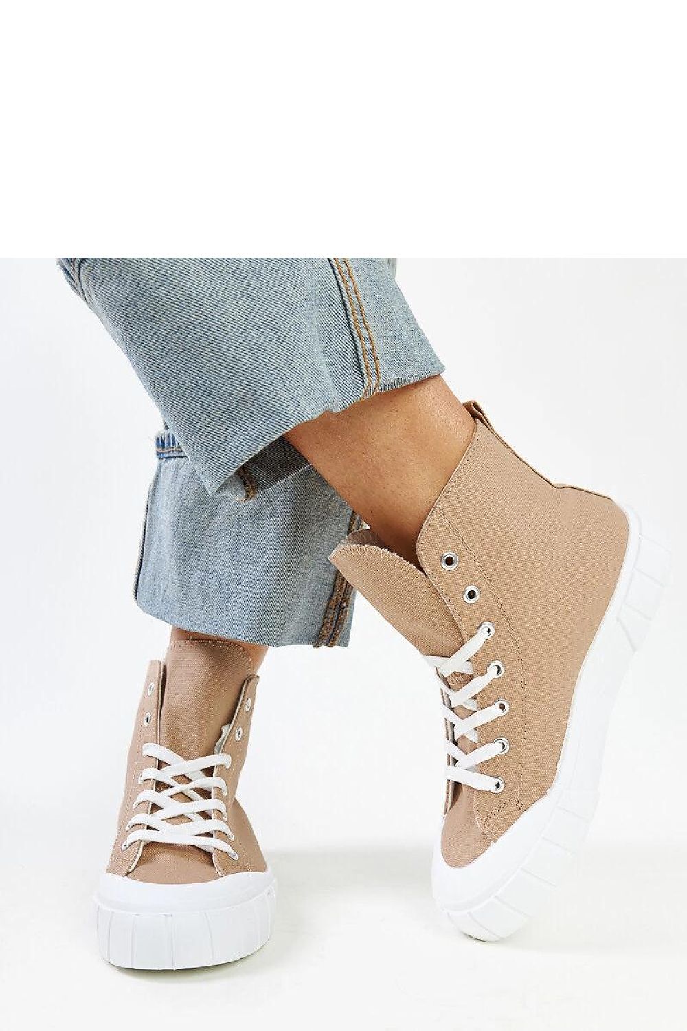 Solea women's high-top sneakers in vibrant pink, combining modern styling with comfort for a trendy urban footwear choice.