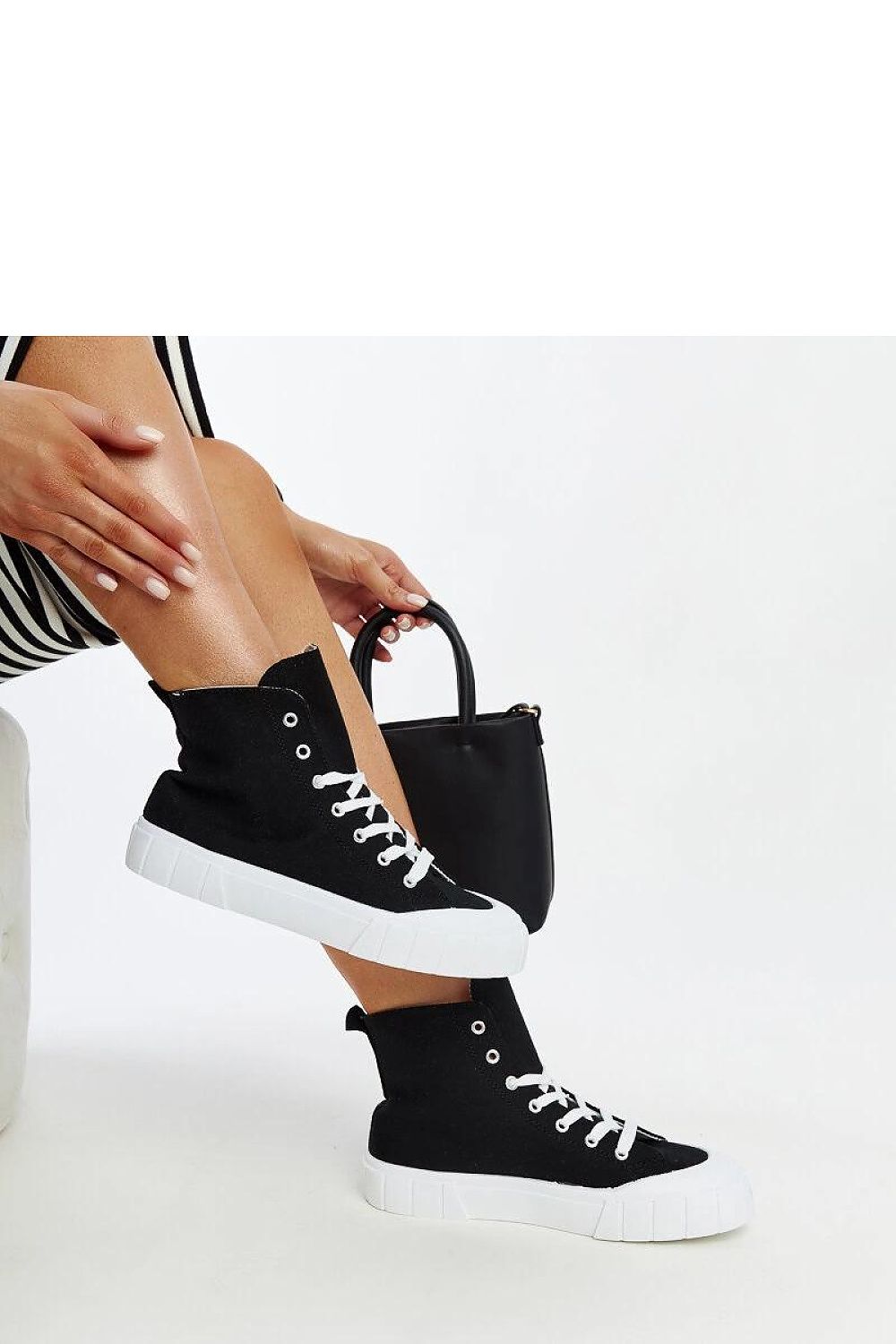 Stylish Solea Pink High-Top Sneakers demonstrating their chic rounded front and summer-ready fabric, perfect for fashionable outings.