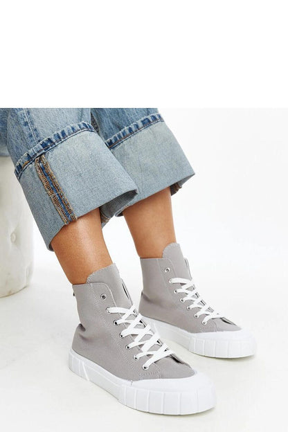 Chic Solea Pink High-Top Sneakers captured from the side, highlighting their fashionable appeal and supportive construction.