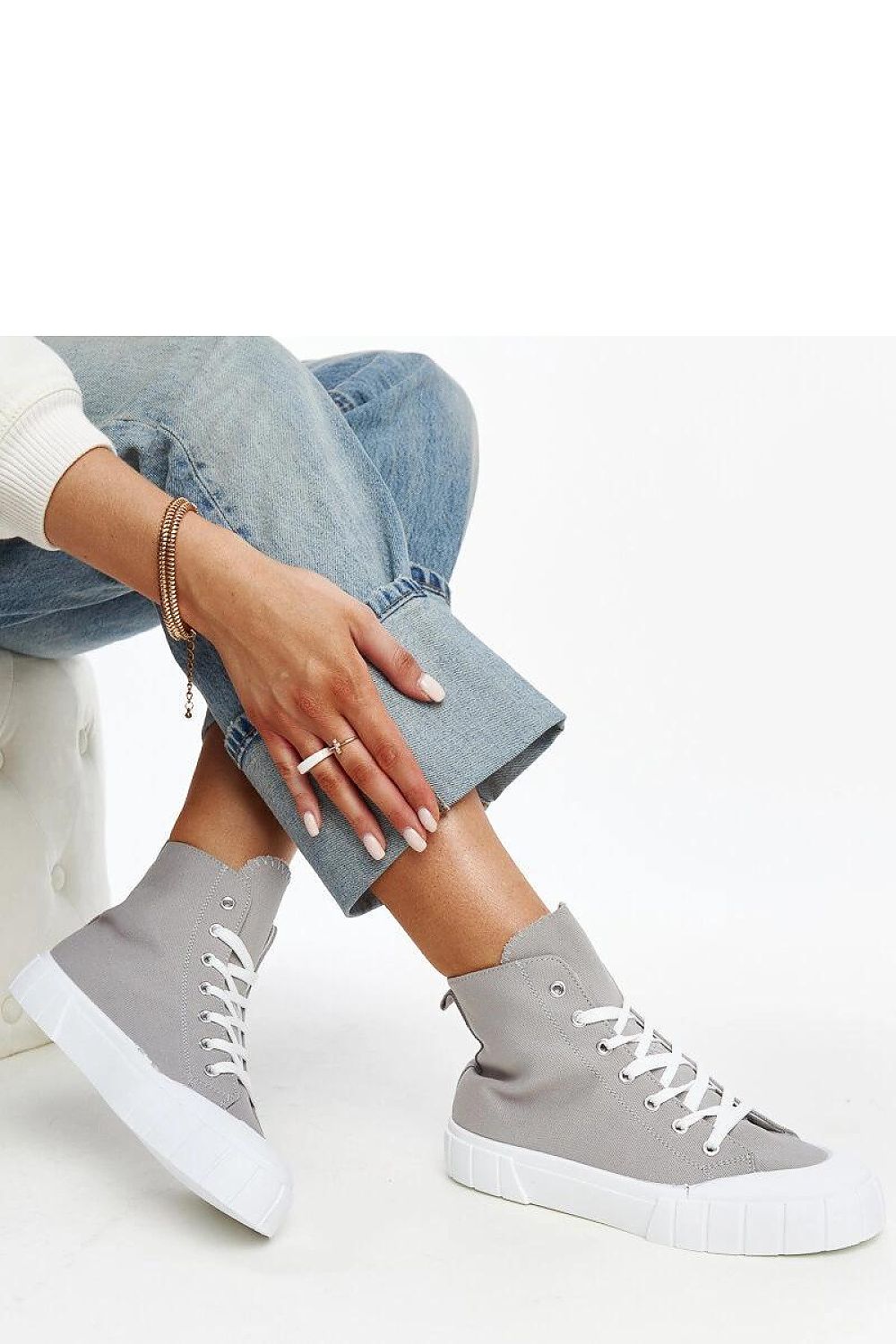 Elegant Solea Pink High-Top Sneakers displaying the luxurious rubber sole and stylish design, perfect for elevating any casual outfit.