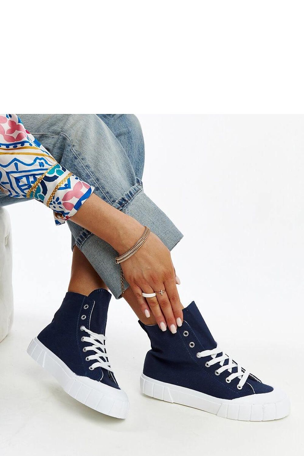 Solea pink high-top sneakers for women, featuring stylish lacing and durable rubber sole, exemplifying luxury urban footwear.