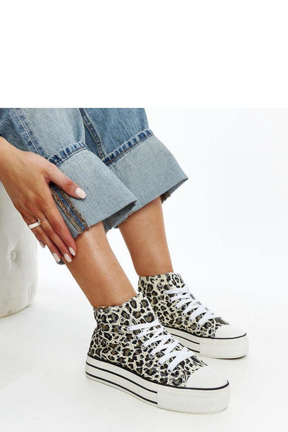 Luxury high-top leopard print sneakers by Solea featuring a thick rubber sole, ideal for chic urban styling.
