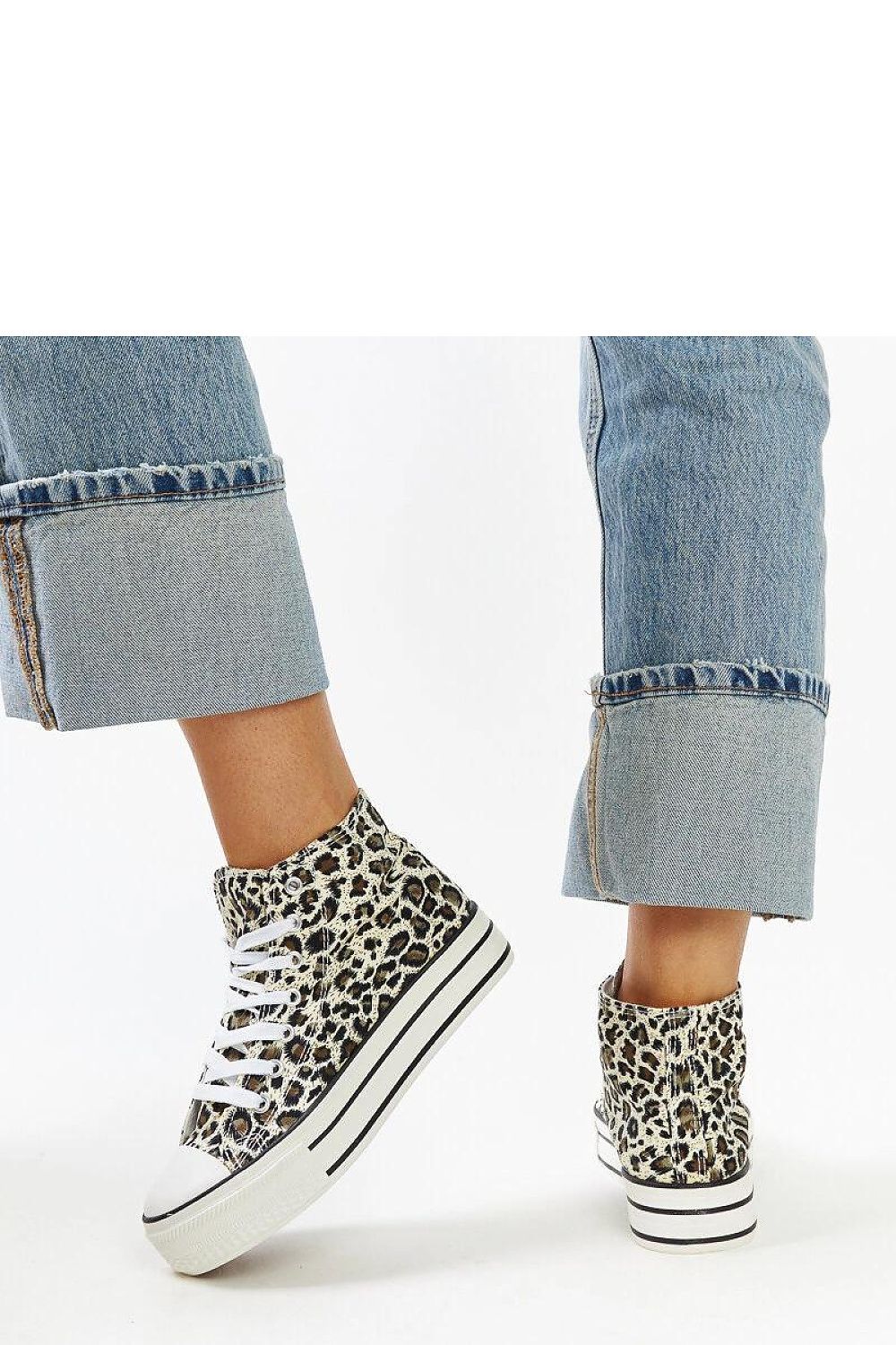 Solea's chic high-top sneakers in leopard print, designed for the modern woman who embraces urban fashion.