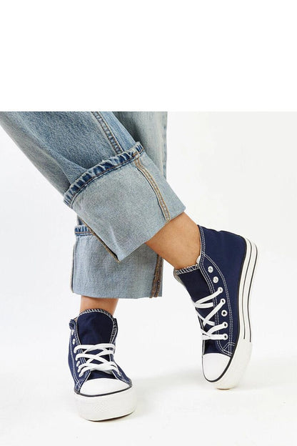 Close-up view of Solea's high-top leopard print sneakers, showcasing premium fabric and a trendy laced design.