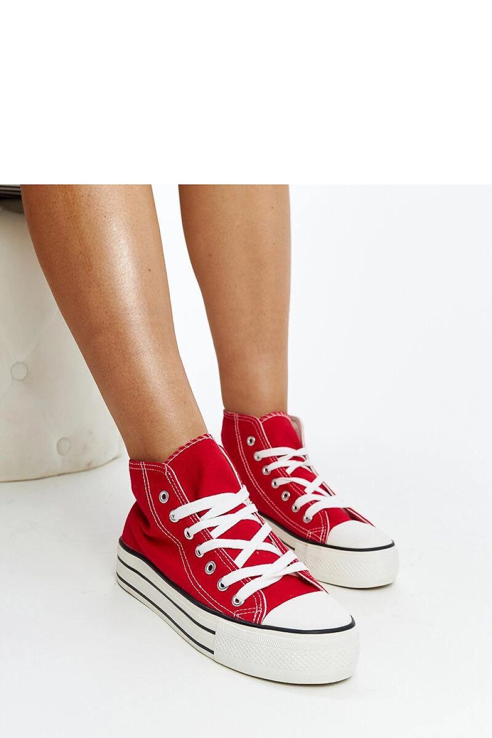 Solea high-top leopard print sneakers elegantly displayed to emphasize their urban chic appeal and luxurious comfort.