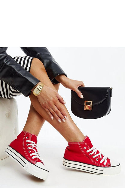 Side view of Solea high-top leopard print sneakers with a thick rubber sole, exuding modern sophistication.