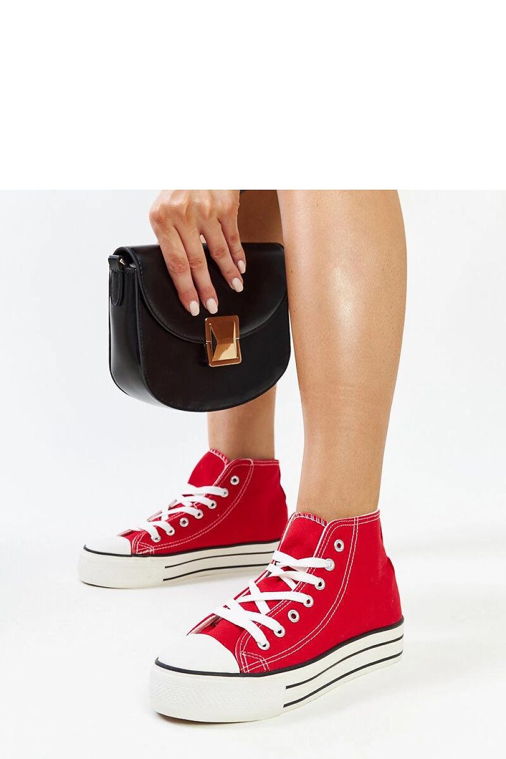 Solea high-top leopard print sneakers presented against a stylish backdrop, illustrating their must-have status for any fashion-forward wardrobe.