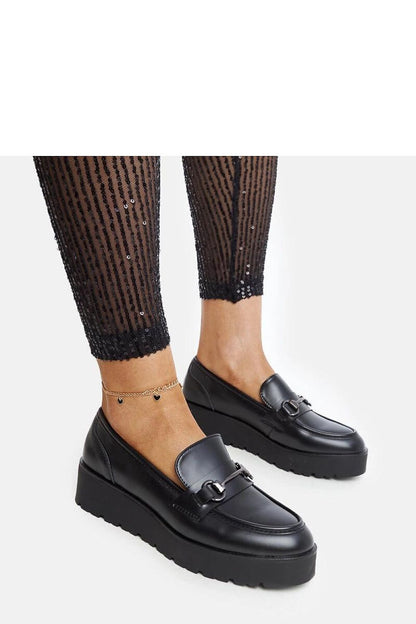 Fashionable black wedge moccasins from Solea, featuring eco leather and a slip-on style, suitable for various occasions, accentuating elegance and comfort in women's footwear.