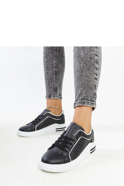 Elegant Solea Glitter Black Sneakers showcasing a stylish perforated design, ideal for fashionable adventurers.